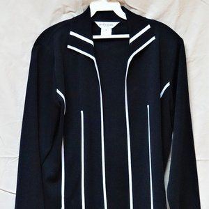 Black and White Trim Acryllic Jacket, size small.